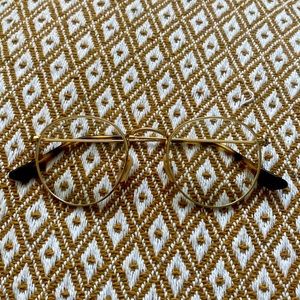 RayBan Gold Metal Frames with prescription lenses.